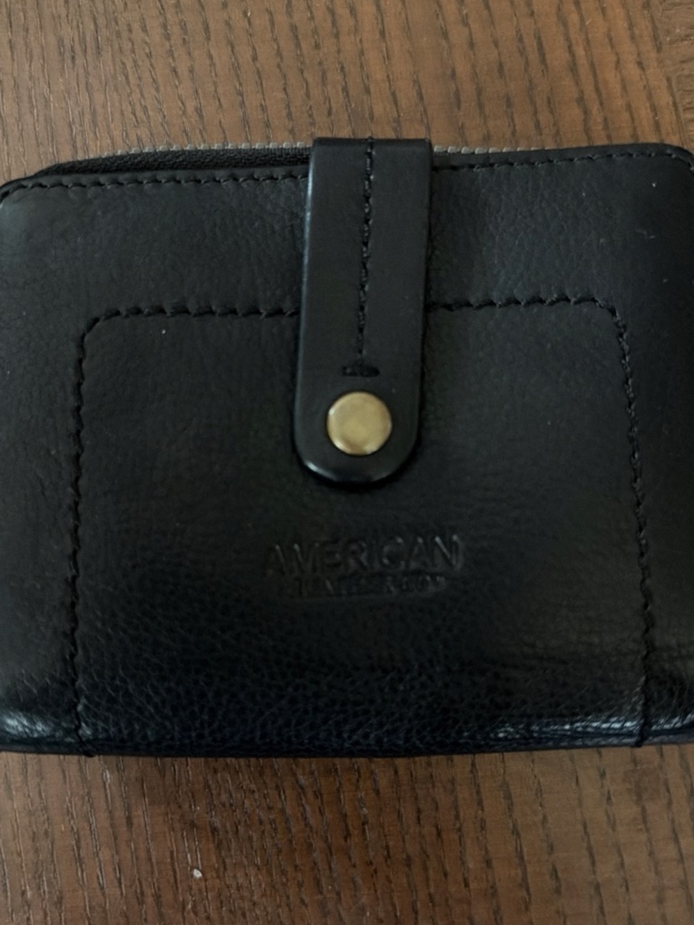 Black Leather Wallet with Snap Closure
